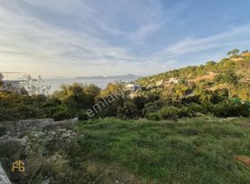 Fethiye Gayrimenkulden Deniz Manzaralı 250mt2 İmarlı Tarla
