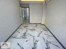 *genç Grup* Fatih Mah. Ara Kat Asansörlü Cam Balkonlu 1+1 Daire