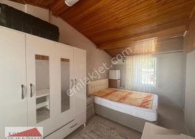 Kavuşturan Emlak'tan Akçay Güre'de Deniz Manzaralı Satılık Villa