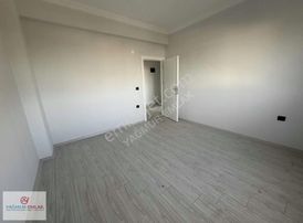 Yağmur Emlaktan Ara Kat Yerden Isıtma İskanlı Sıfır 2+0 Daire