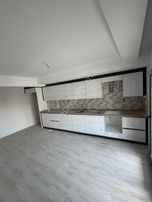 Turgutlu Eymen Emlak'tan Bayramyeri Civarı 2+1 Arakat Otoparklı Satılık Daire