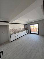 Turgutlu Eymen Emlak'tan Bayramyeri Civarı 2+1 Arakat Otoparklı Satılık Daire