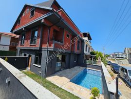4+1 Ön Cephe, Müstakil Havuzlu Yerden Isıtmalı Merkezi Konumda Satılık Villa