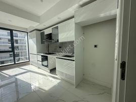 Siteiçinde Ayrı Mutfaklı Katta 2+1 Satılık Daire