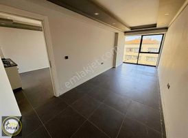 Stm Emlaktan Atatürk Cad. Plaza İçerisinde Kiralık 1+1 Daire