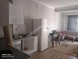 Yenişehir Güvenç Rezidansta Satlık 1+1 Dayalı Döşeli Daire