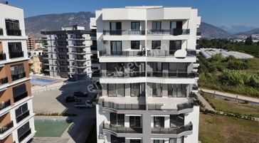 07 Truva Emlaktan Finike Sahilde Deniz Manzaralı Satılık Daire