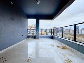 Çetin Emlak'hastane Yanı,teras Balkon,çift Banyo 'sıfır' 2+1