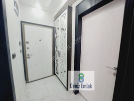 Denizden Akçayda Kapalı Otoparklı Yerden Isıtmalı Satılık 1+1 Daire.