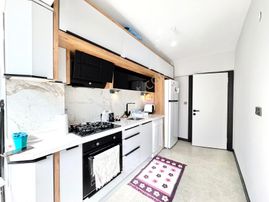 ♫melodi'den Akçay Merkez'de Ön Cephe Arakat Ayrı Mutfaklı Harika Tasarımlu 2+1 Daire