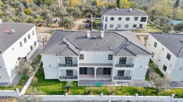 Mahmut İşler'den Güre'de Satılık Bahçeli 1+1 Sıfır Daire