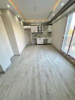 Zeki Emlak'tan Muradiye'de Merkezi Konum Satılık 1+1 Sıfır Daire