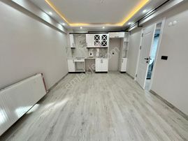 Zeki Emlak'tan Muradiye'de Satılık 1+1 Sıfır Daire