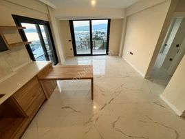 Muğla/milas/güllük'te 2+1 Deniz Manzarasına Hakim Düz Ayak Girişli Kiralık Daire