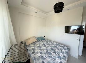 Tüzün'den Mezitli'de 1+1 Eşyalı Havuzlu Satılık Daire