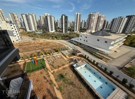 Tüzün'den Mezitli'de 1+1 Eşyalı Havuzlu Satılık Daire