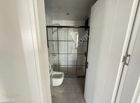 Tüzün'den Mezitli'de 2+1 Havuzlu Satılık Daire