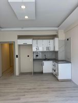 Kuşadası Davutlar'da 3+1 Merkezi Konumda Satılık Çatı Dubleks Daire