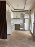 Davutlar'da Merkezi Konumda 2+1 Sıfır Satılık Daire