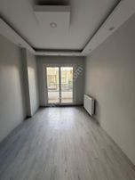 Turgutlu Kiralık Albayrak Mah Cami Önü Civarı Sıfır Otopark Üstü 1. Kat 140m2 3+1 Oda