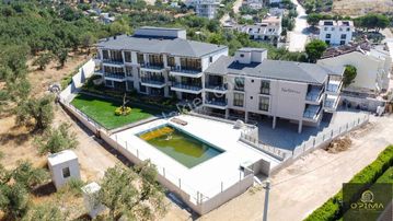 Opima Emlaktan Havuzlu Lüx Site İçerisinde 2+1 Satılık Daire