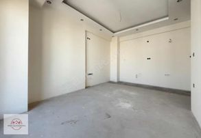 Bornovada Site İçi İzev Yapı Kalitesiyle Satılık 1+1 Sıfır Daire