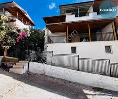 Didim Akbük'te Denize Sıfır Site İçerisinde Deniz Manzaralı Bahçeli 3+1 Yazlık