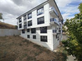 Dikmen'de Sıfır Binada Satılık 1+1 Daire