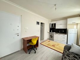 Çiğli Efesus Outlet Yakını Eşyalı 1+1 Satılık Daire