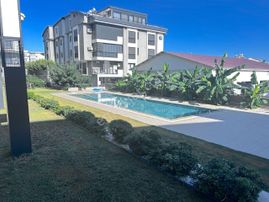 Didim Efeler Mahallesi’nde Özel Sitede Satılık Bahçe Katı Daire – Kapalı Otopark & Havuzlu