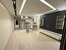 Kuşadası Davutlar Merkezi Lokasyonda Satılık 1+1 Daire