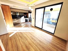 Aygül'den Akçay'da Modern Tasarımlı Sıfır Denize Yakın Asansörlü Geniş Balkonlu 2+1 Satılık Dubleks