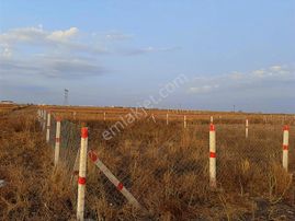 Asfalt Cephe Etrafı Çevrili Parselimiz Araç Takaslı