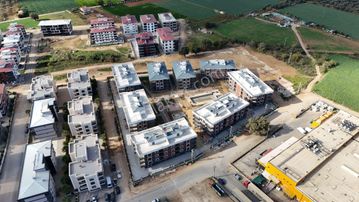 Torbalı Kipa'ya Komşu Havuzlu Güvenlikli Sitede Sıfır 2+1..