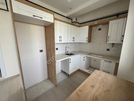 Asil Emlak'tan Site İçerisinde 1+1 Ara Kat Fırsat Daire