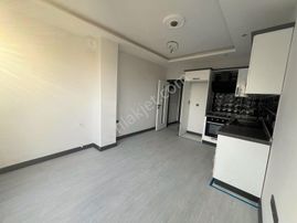 Akçay Aras Emlaktan Altınkumda Sıfır 1+1 Daire