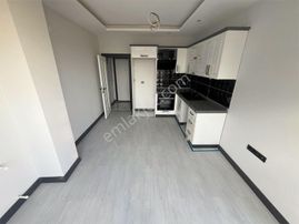 Akçay Aras Emlaktan Altınkumda Sıfır 1+1 Daire