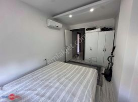 Güzeloba'da Havuzlu Kapalı Otoparklı 1+1 Eşyalı Kiralık Daire