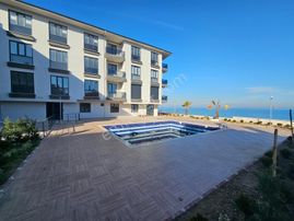 Havuzlu Sitede Ve Kumsal Önü 2+1 Yerden Isıtmalı Ara Kat Daire