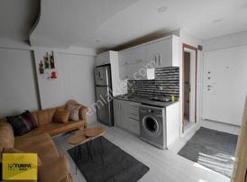 Turpa Buca'dan Kiralık 1+1 Bahçe Katı Eşyalı Klimalı Daire
