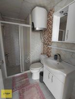 Turpa Buca'dan Kiralık 1+1 Bahçe Katı Eşyalı Klimalı Daire