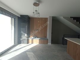 Kuşadası Merkezde Satılık 6+1 Özel Havuzlu Sıfır Villalar