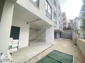 Üstünel'den Görüklede Sıfır Bina Sıfır Eşyalı 1+1 Satılık Daire