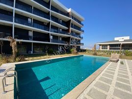 Kuşadası Değirmenderede Havuzlu Sitede Eşyalı Kiralık 2+1 Arakat