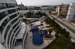 Antalyada Kundu Bolgesınde Otel Konseptınde Satılık 2+1