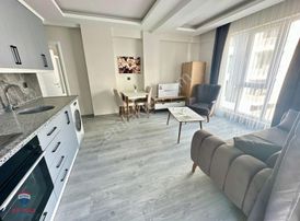 Remax Modern Bülent Ak'dan Körfezde Eşyalı Satılık 1+1 Daire