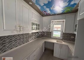 Tarssa Gayrimenkul'den Satılık Dikili'de 4+1 Triplex Villa!