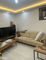 Döşemealtı Yeniköy De Merkezi Konumda Yeni Binada Katta Daire