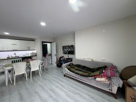 Güzelçamlı'da Satılık Geniş Teraslı 1+1 Merkezde Daire