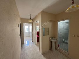 Kuşadası Güzelçamlı'da Satılık 2+1 Ayrı Mutfak Ara Kat Daire